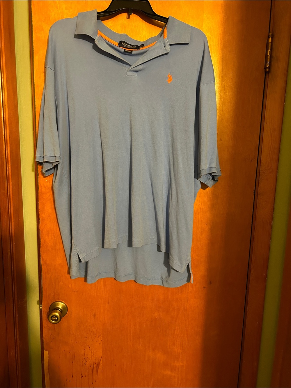 U.S. Polo Assn. Light Blue Polo with Orange Logo Accent